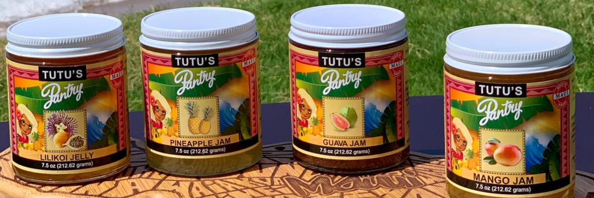 Tutu's Pantry Goodies made in Hawaii with Aloha 6 Assorted bottles of Tutu's Pantry tropical jams lined up for pairing inspiration